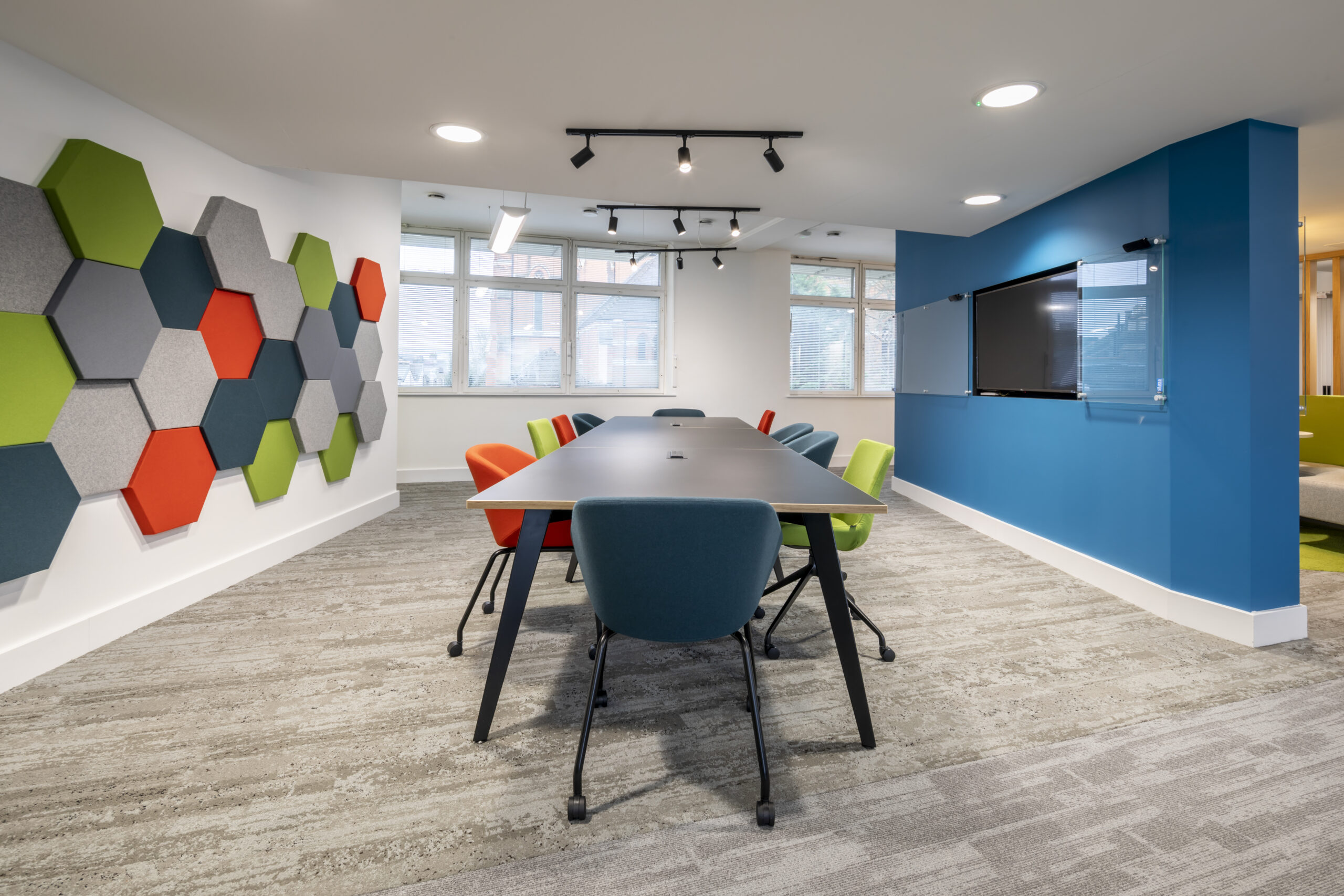 How Do Acoustic Ceiling Panels Improve Sound in OpenPlan Spaces?